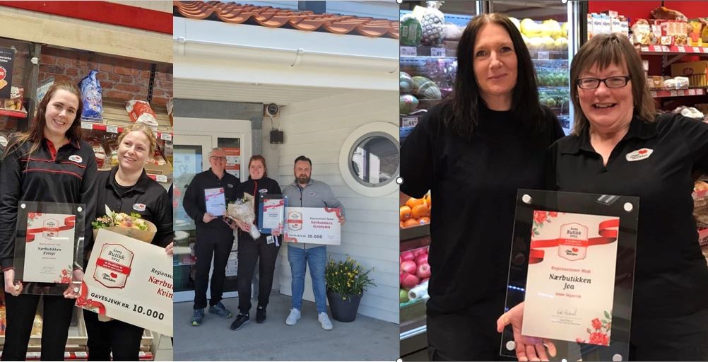 Butikkeiere og ansatte smiler og holder frem diplomet de ble tildelt.